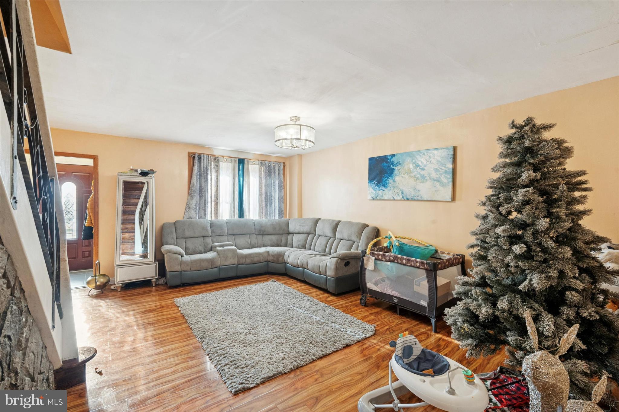 213 East Claremont Road Philadelphia, PA 19120 - Photo 4 of 25 a living room with furniture and a couch
