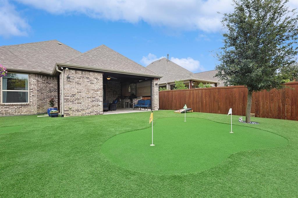 1601 Twistleaf Road Flower Mound, TX 76226 - Photo 11 of 39 a backyard of a house with lots of green space