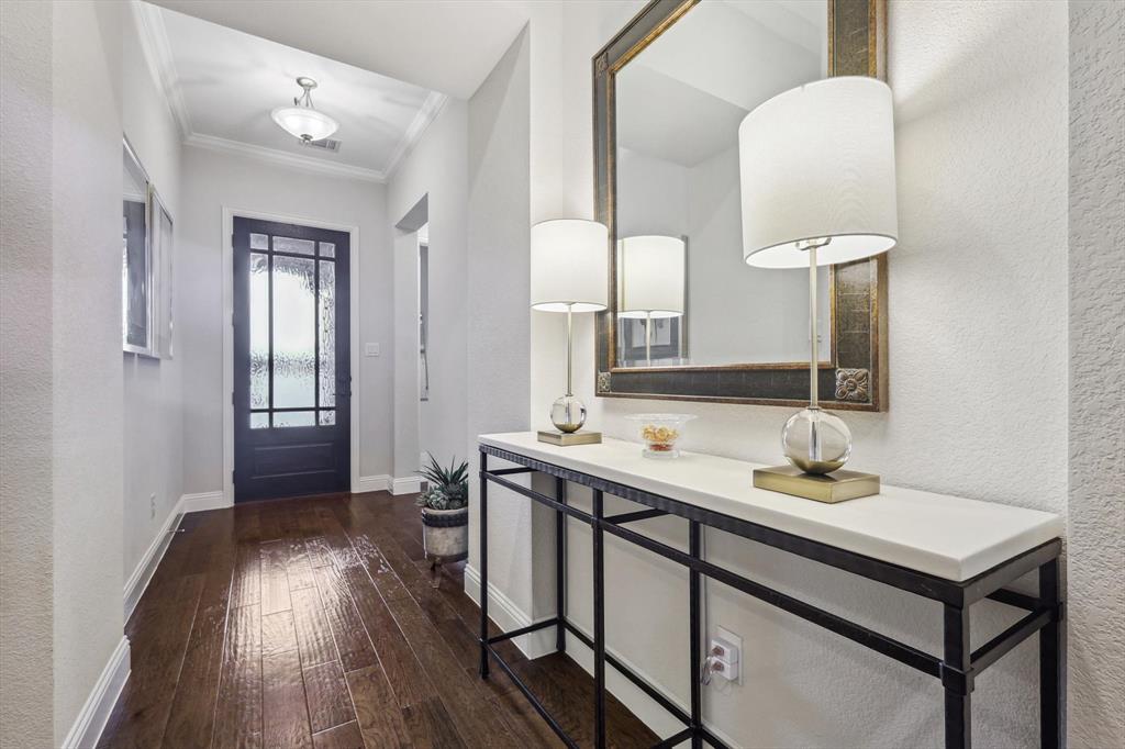 1601 Twistleaf Road Flower Mound, TX 76226 - Photo 14 of 39 a bathroom with a sink a vanity and a mirror