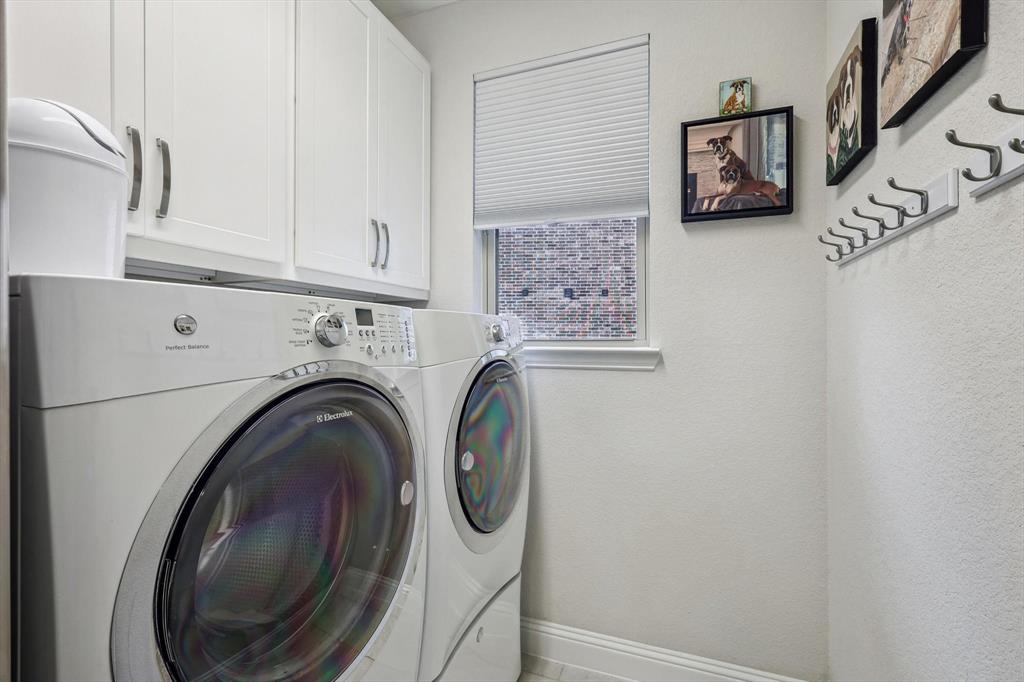 1601 Twistleaf Road Flower Mound, TX 76226 - Photo 19 of 39 a utility room with dryer and washer