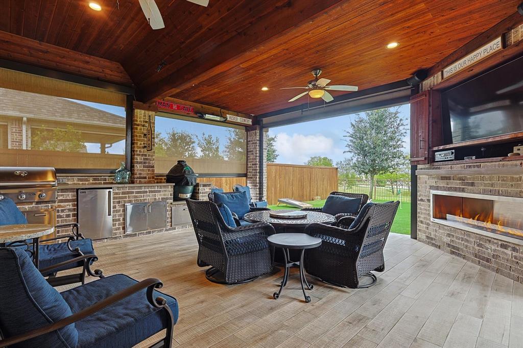 1601 Twistleaf Road Flower Mound, TX 76226 - Photo 2 of 39 a outdoor living space with patio furniture and a fireplace