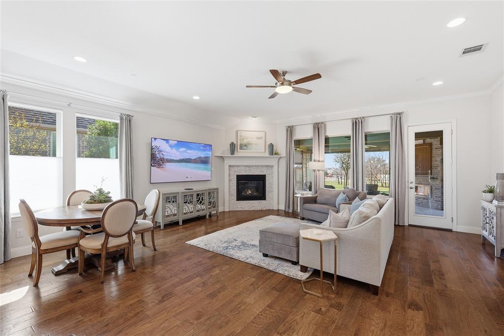 1601 Twistleaf Road Flower Mound, TX 76226 - Photo 22 of 39 a living room with furniture and a fireplace