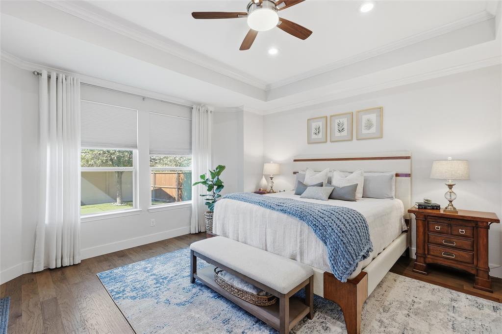 1601 Twistleaf Road Flower Mound, TX 76226 - Photo 26 of 39 a spacious bedroom with a bed a window and potted plant