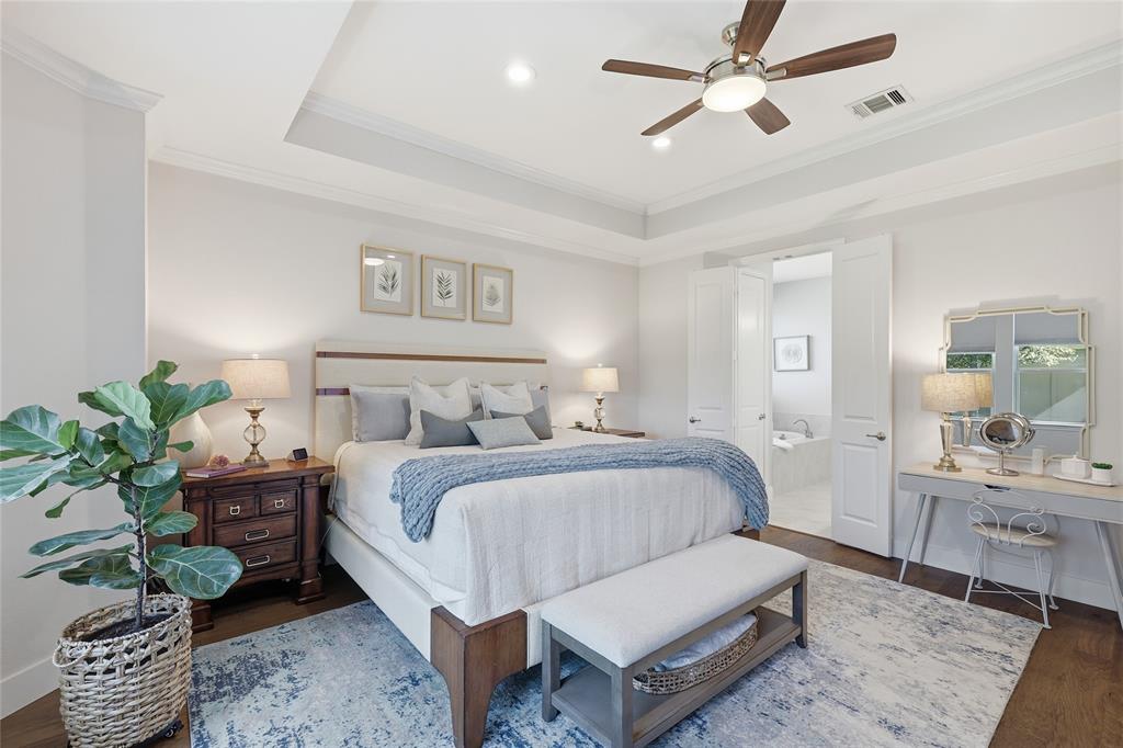 1601 Twistleaf Road Flower Mound, TX 76226 - Photo 27 of 39 a spacious bedroom with a bed a couch and potted plant