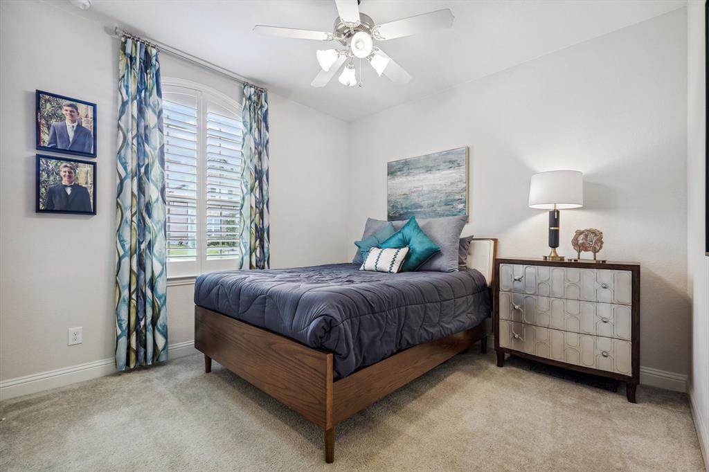 1601 Twistleaf Road Flower Mound, TX 76226 - Photo 33 of 39 a spacious bedroom with a bed and a cabinets