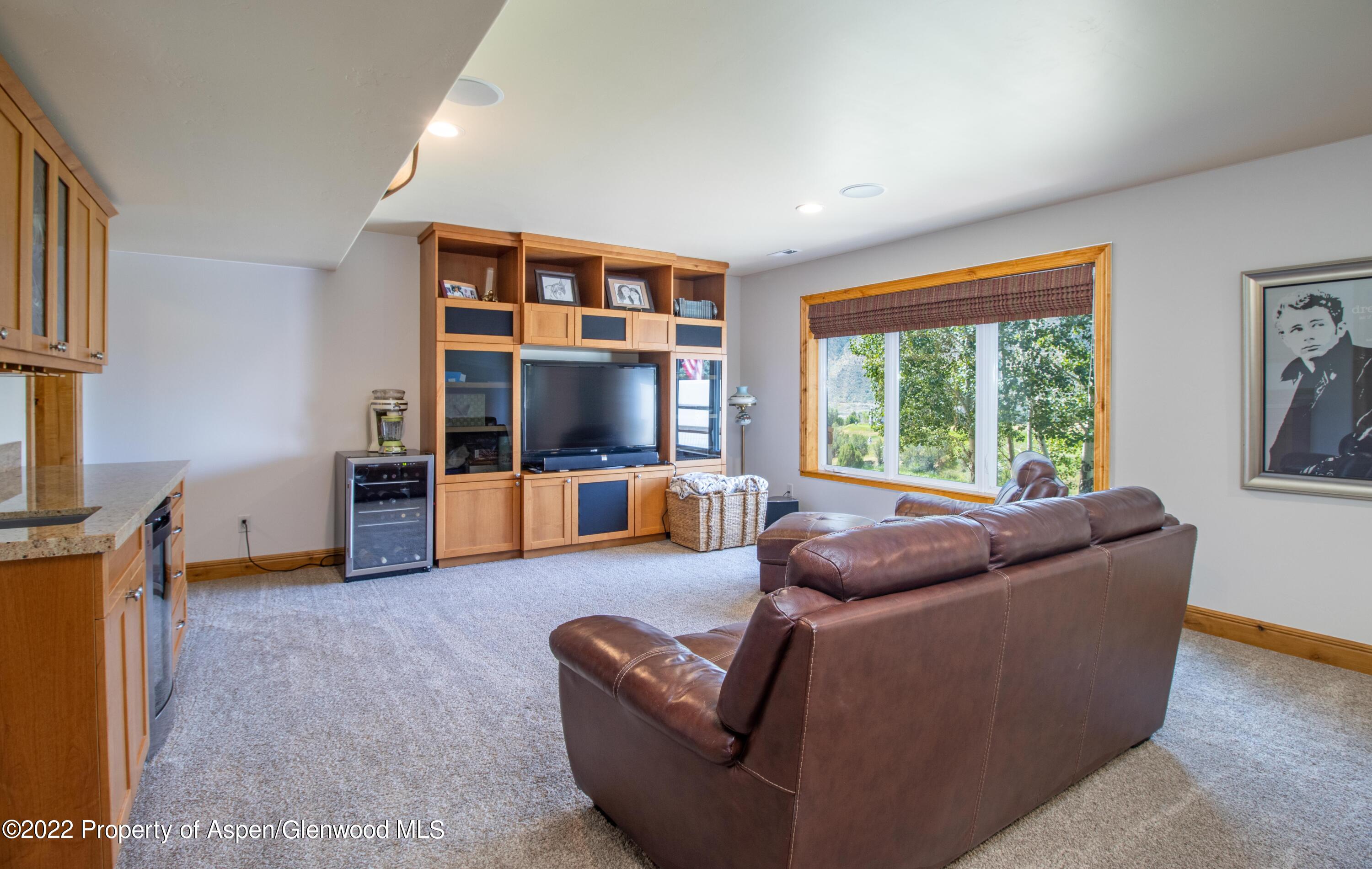 323 Faas Ranch Road New Castle, CO 81647 - Photo 17 of 22 a living room with furniture and a large window