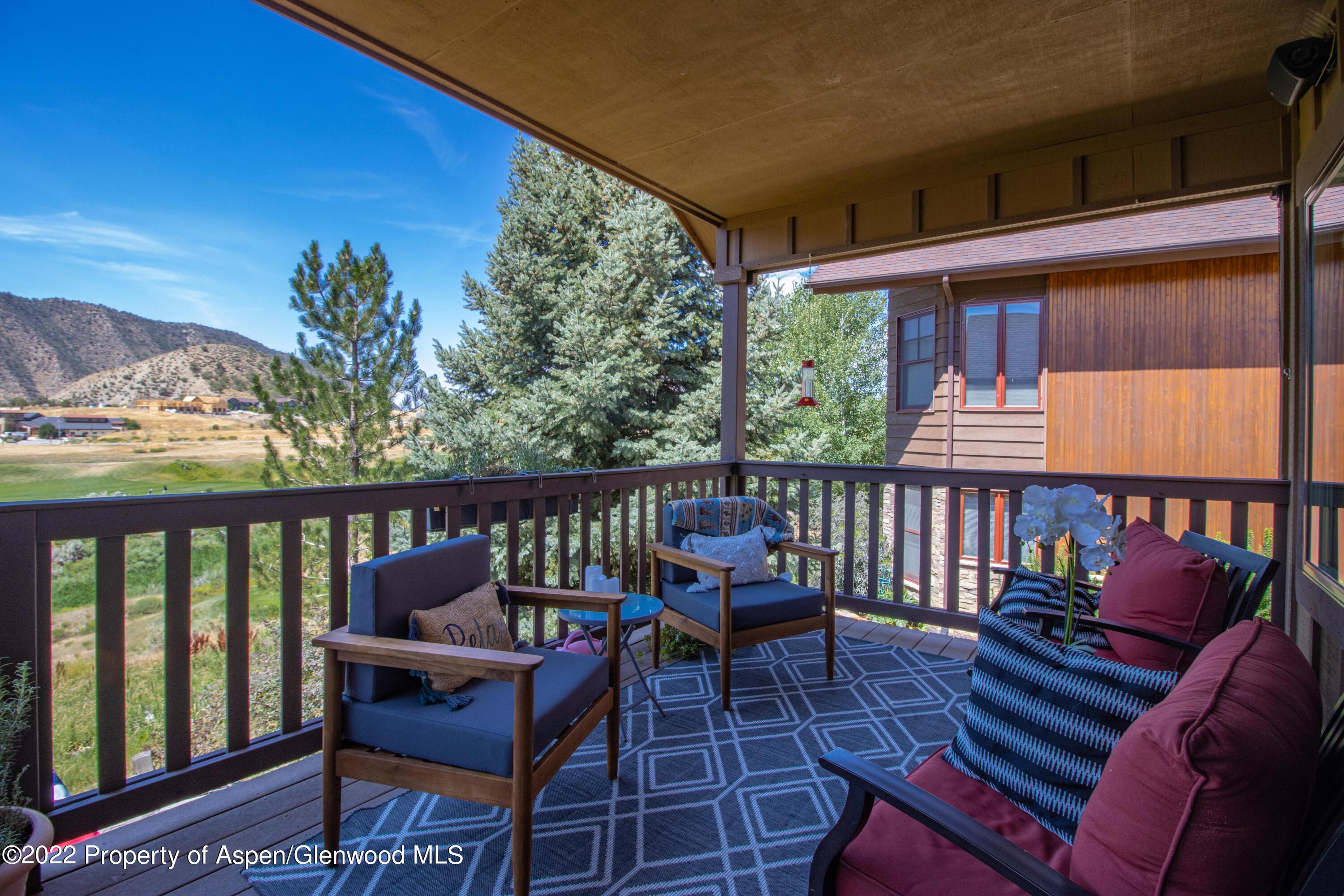 323 Faas Ranch Road New Castle, CO 81647 - Photo 6 of 22 a view of a chairs and table on the balcony
