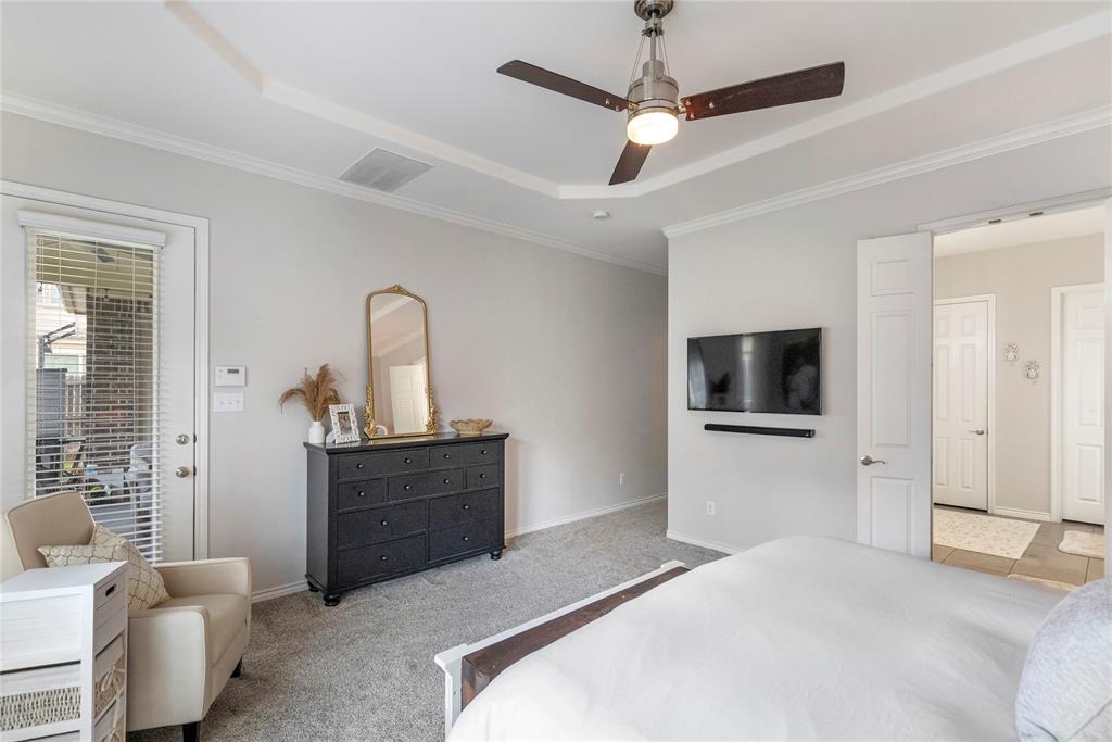 11604 Compton Trail Fort Worth, TX 76244 - Photo 13 of 40 a bedroom with a bed and a television