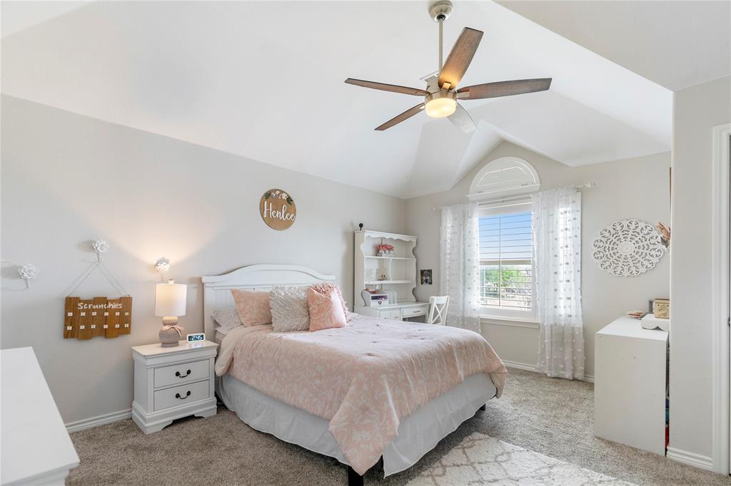 11604 Compton Trail Fort Worth, TX 76244 - Photo 21 of 40 a bedroom with a large bed and a window