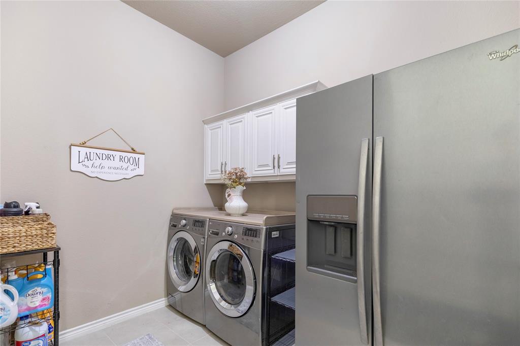 11604 Compton Trail Fort Worth, TX 76244 - Photo 32 of 40 a utility room with dryer and washer