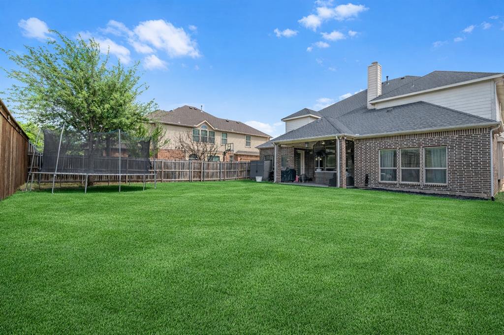 11604 Compton Trail Fort Worth, TX 76244 - Photo 35 of 40 a view of a house with a backyard