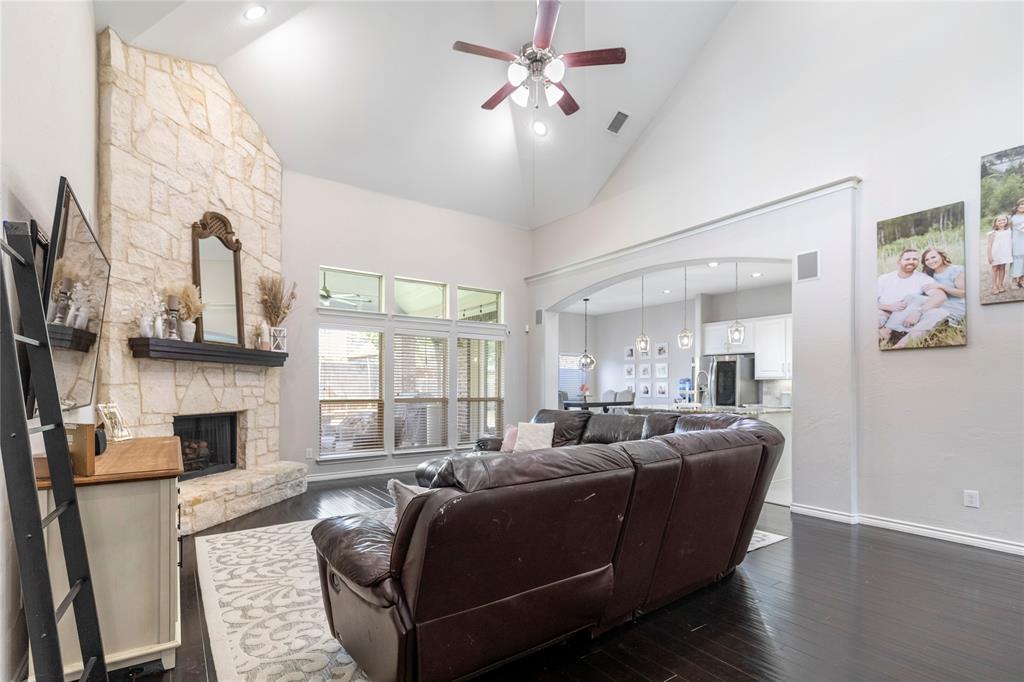 11604 Compton Trail Fort Worth, TX 76244 - Photo 10 of 40 a living room with furniture fireplace and flat screen tv