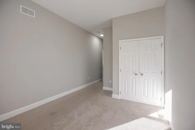 a bathroom with a sink a mirror and vanity