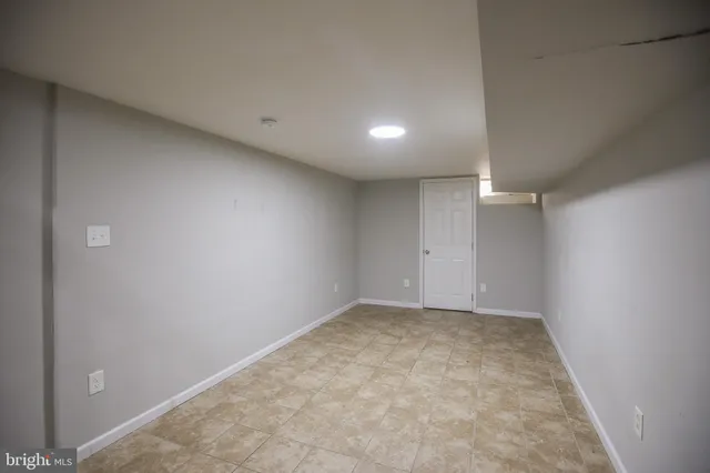 a outdoor dining space with furniture and potted plants