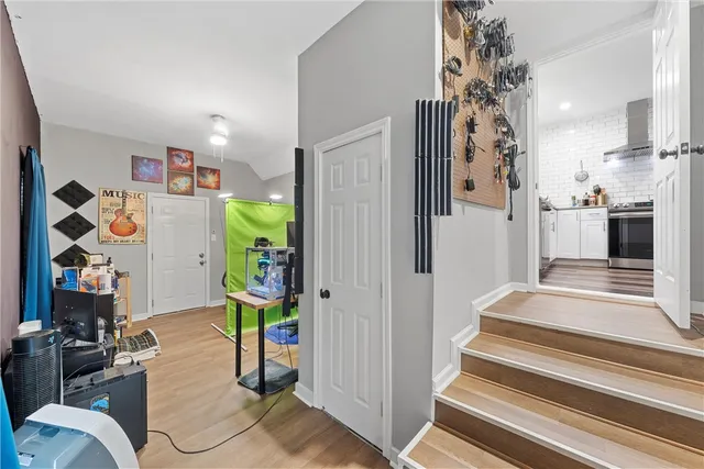 a view of an entryway and livingroom