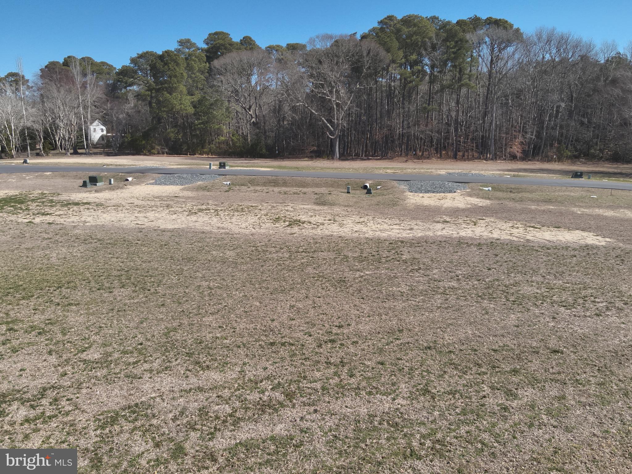8 Stephen Decatur Highway Ocean City, MD 21842 - Photo 12 of 18 a view of a field with trees in the background