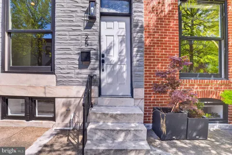 a brick building with a door and a window