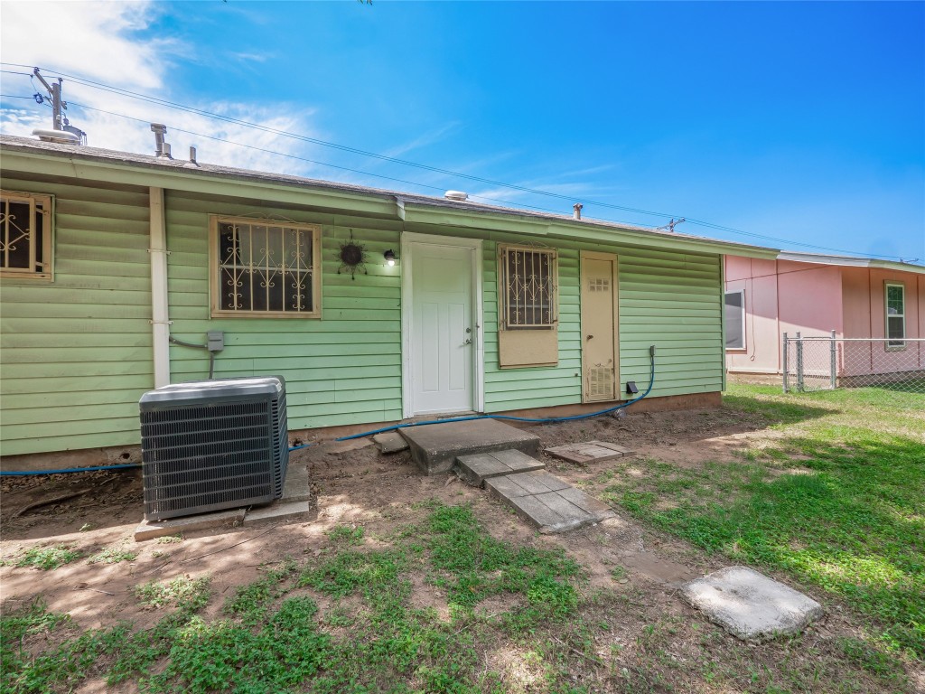 1021 Gardner Road Austin, TX 78721 - Photo 24 of 31 a front view of a house with a yard