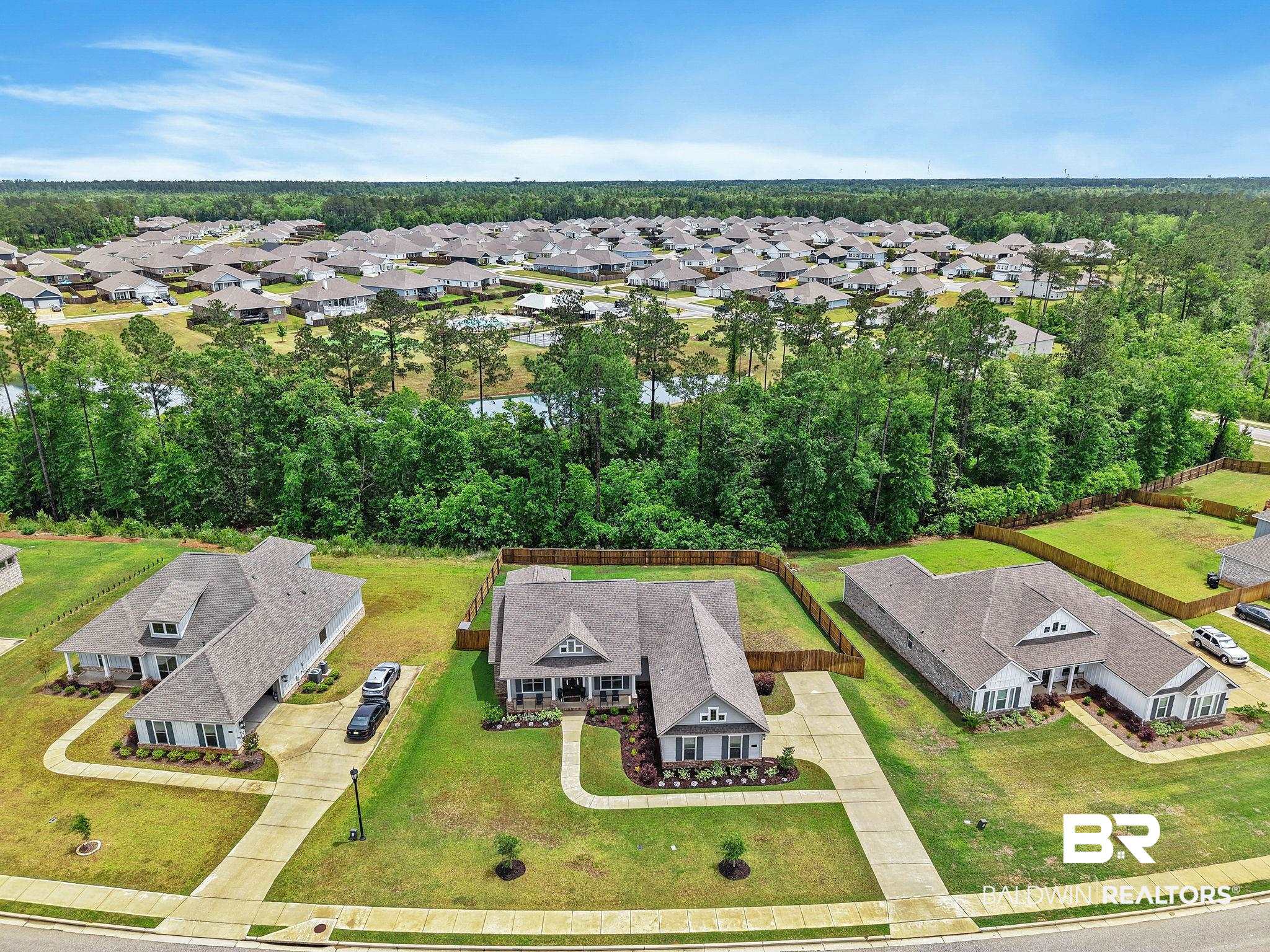 13233 Ibis Boulevard Daphne, AL 36527 - Photo 71 of 100 Aerial perspective showcasing a residential community with mature tree lines