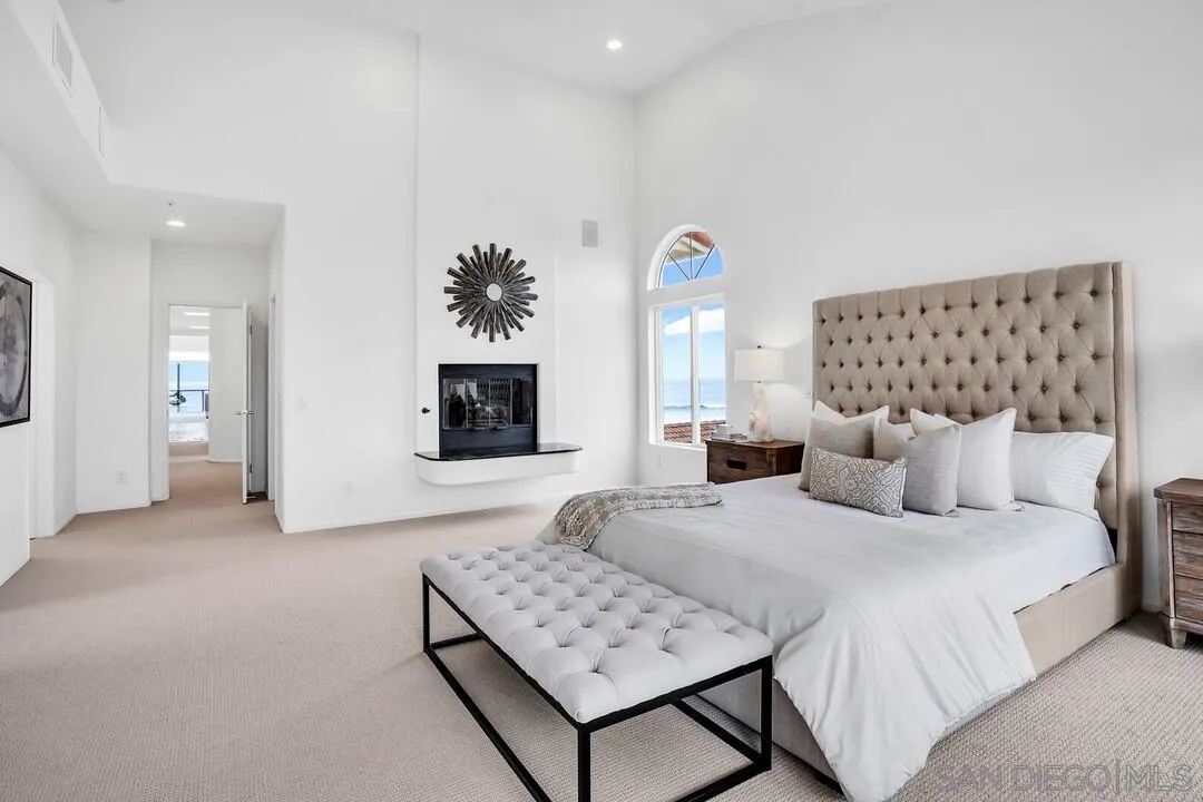 1206 Seacoast Drive, Unit C Imperial Beach, CA 91932 - Photo 17 of 32 a bedroom with a bed and a couch