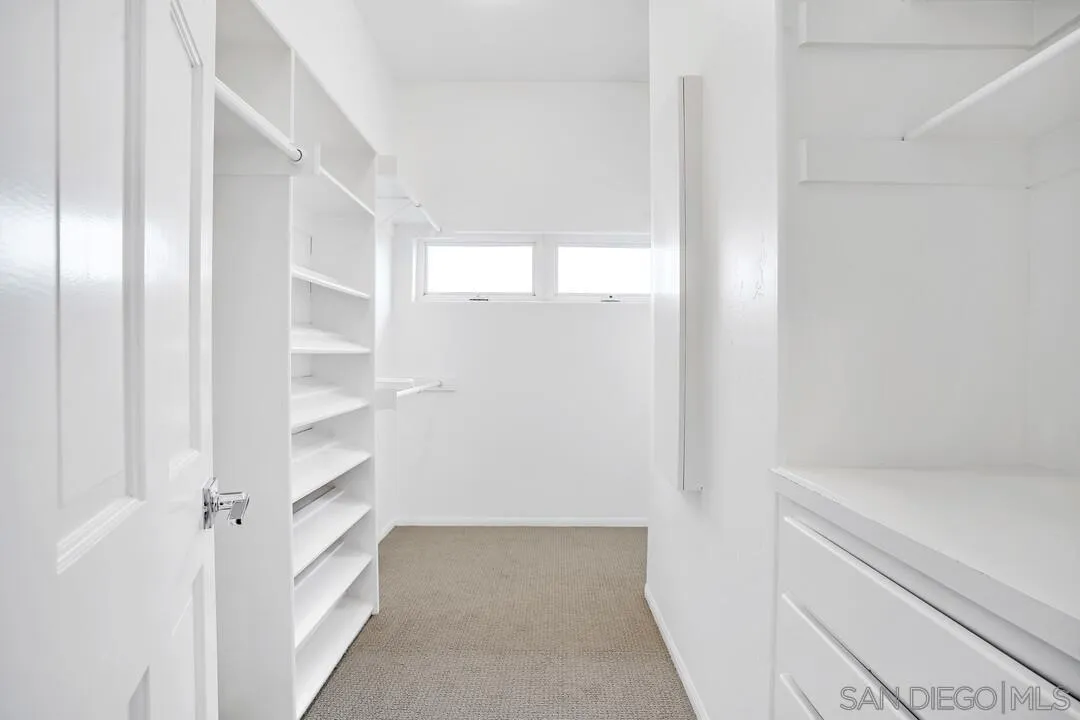 1206 Seacoast Drive, Unit C Imperial Beach, CA 91932 - Photo 21 of 32 a view of walk in closet with empty racks