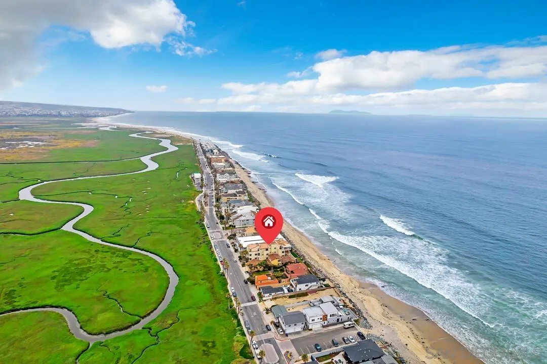 1206 Seacoast Drive, Unit C Imperial Beach, CA 91932 - Photo 29 of 32 an aerial view of a golf course with a swimming pool