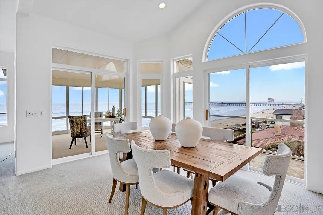 1206 Seacoast Drive, Unit C Imperial Beach, CA 91932 - Photo 3 of 32 a view of a dining room with furniture and chandelier