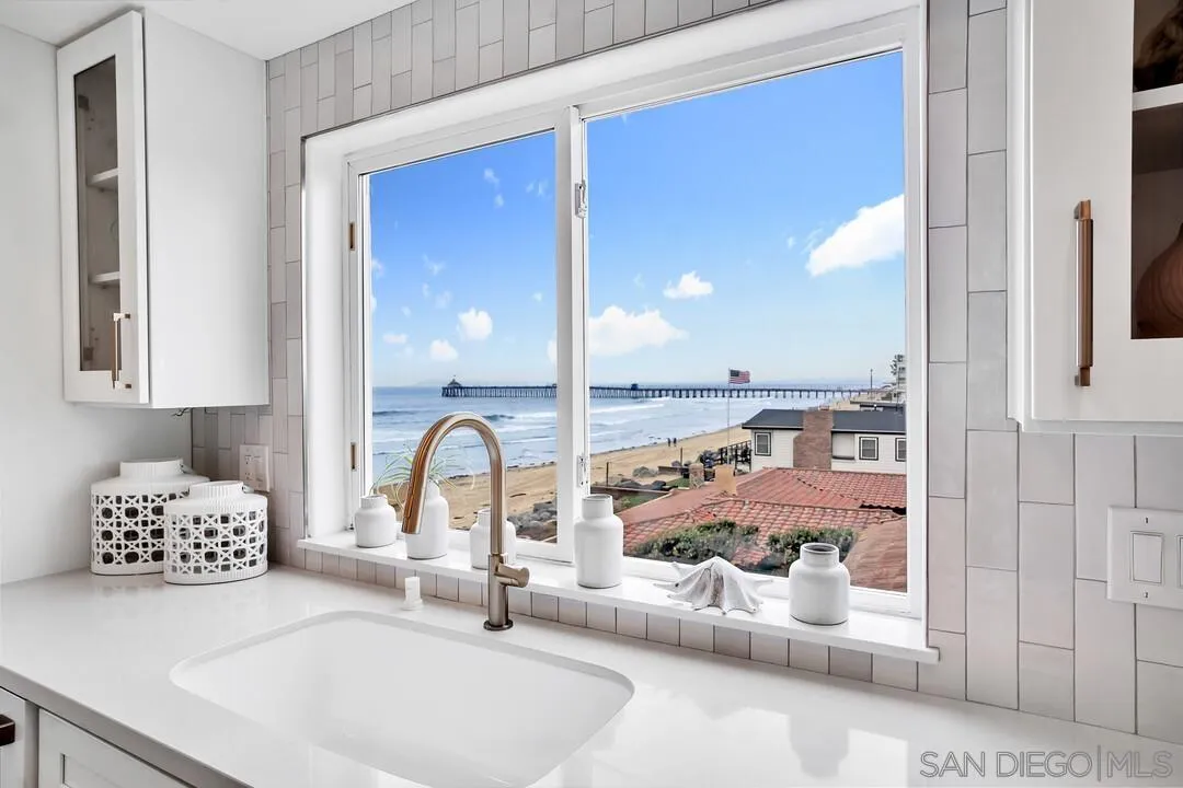 1206 Seacoast Drive, Unit C Imperial Beach, CA 91932 - Photo 6 of 32 a bathroom with a sink and a mirror