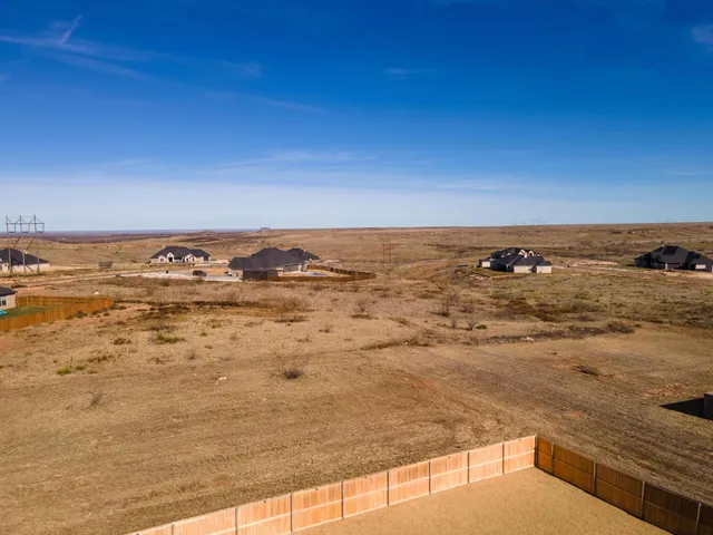 a view of outdoor space and front view of a house