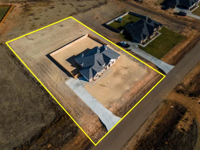 a view of a chairs and tables in the patio