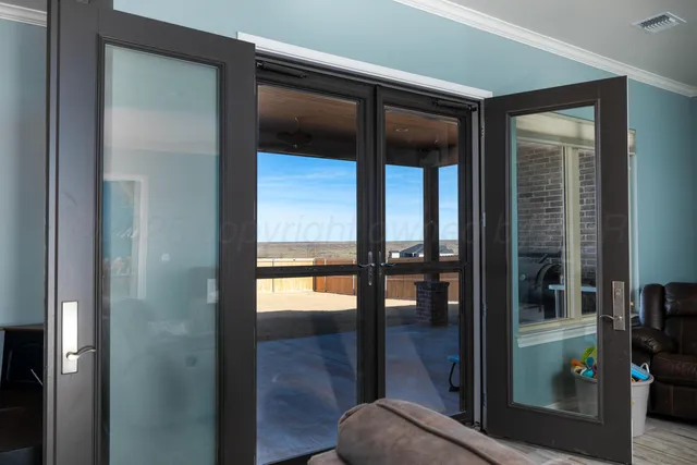 a view of swimming pool with outdoor seating