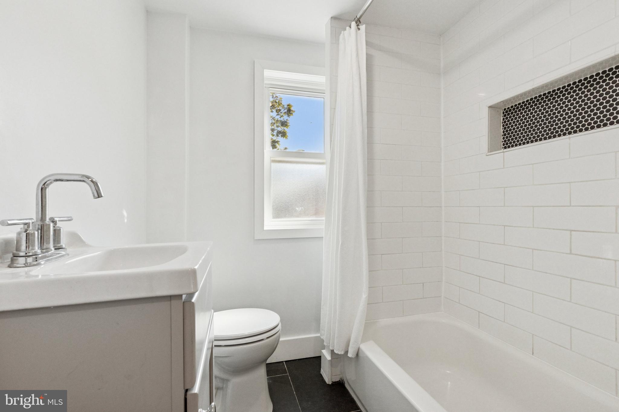 155 Sheldon Lane Ardmore, PA 19003 - Photo 15 of 17 a bathroom with a sink a toilet and shower