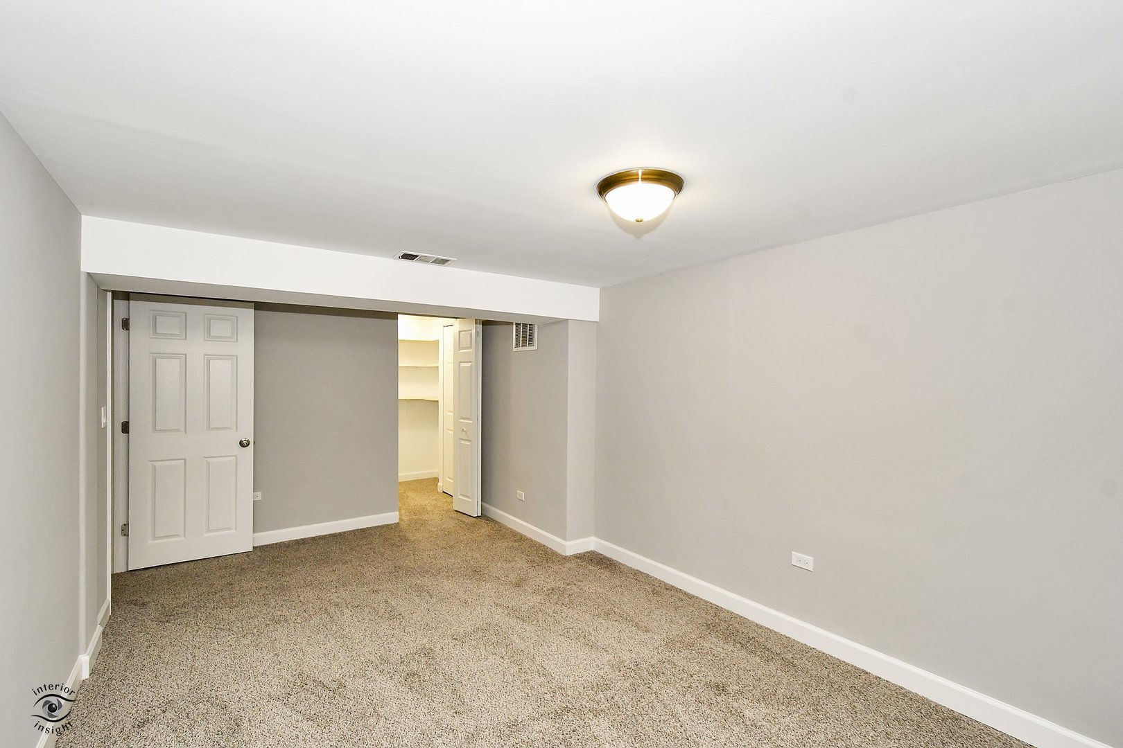 1712 Laurel Drive Mount Prospect, IL 60056 - Photo 21 of 26 a view of an empty room with window and closet area