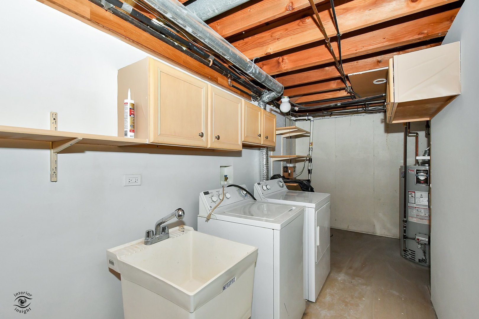 1712 Laurel Drive Mount Prospect, IL 60056 - Photo 24 of 26 a utility room with dryer and washer