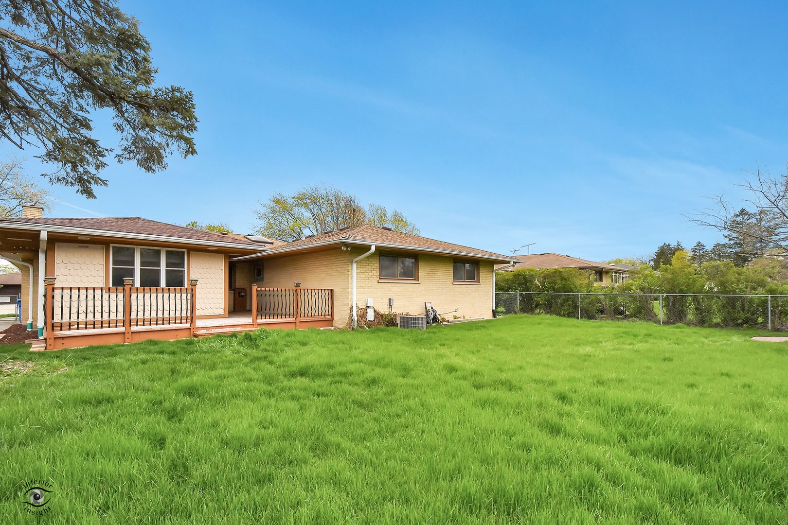 1712 Laurel Drive Mount Prospect, IL 60056 - Photo 26 of 26 a white house with a big yard and large trees