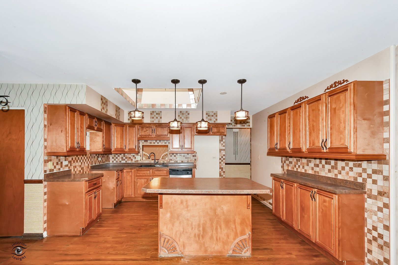 1712 Laurel Drive Mount Prospect, IL 60056 - Photo 6 of 26 a very nice looking kitchen with a large window a oven and a counter top space