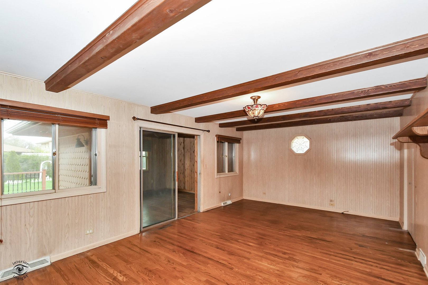 1712 Laurel Drive Mount Prospect, IL 60056 - Photo 8 of 26 a view of empty room with wooden floor