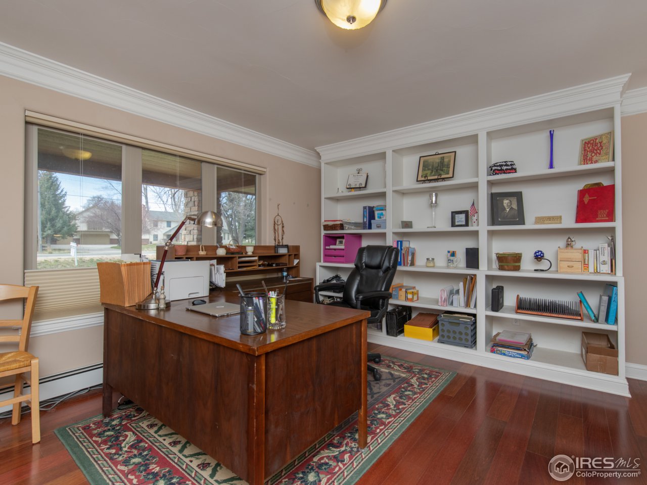 9155 Rogers Road Longmont, CO 80503 - Photo 20 of 39 a view of a workspace with furniture