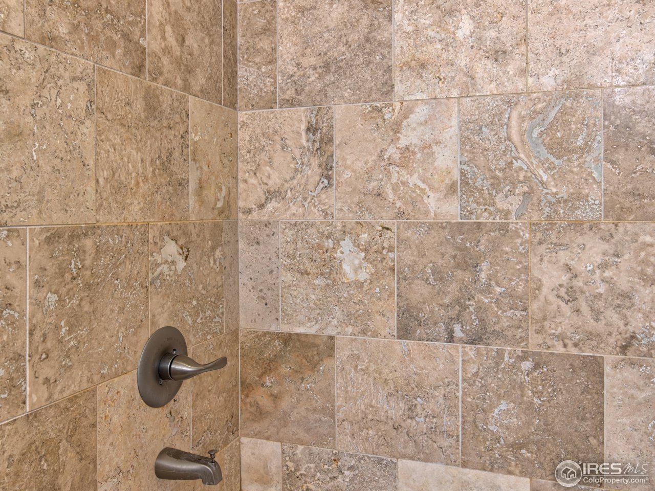 9155 Rogers Road Longmont, CO 80503 - Photo 31 of 39 a bathroom with a shower