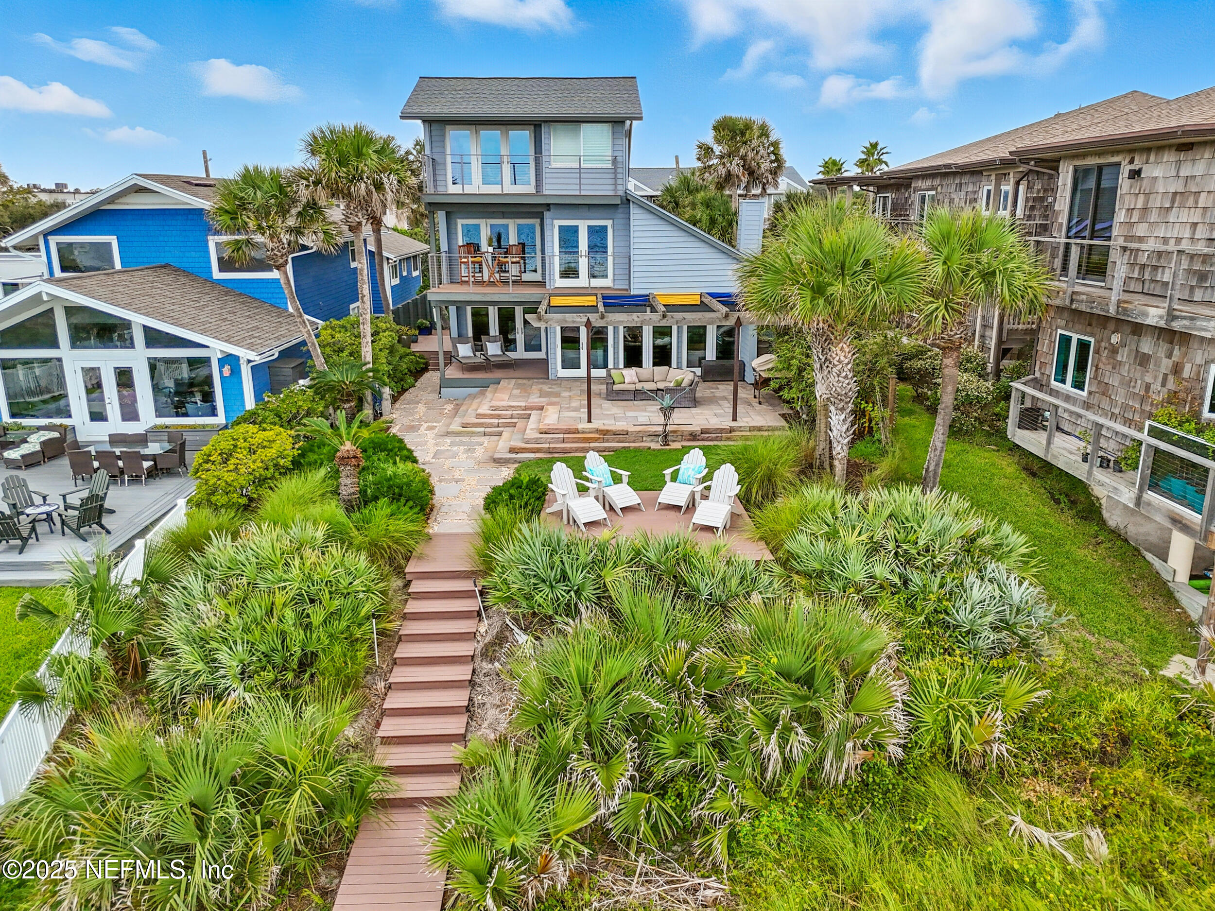 1789 Beach Avenue Atlantic Beach, FL 32233 - Photo 42 of 55 a front view of a house with a yard