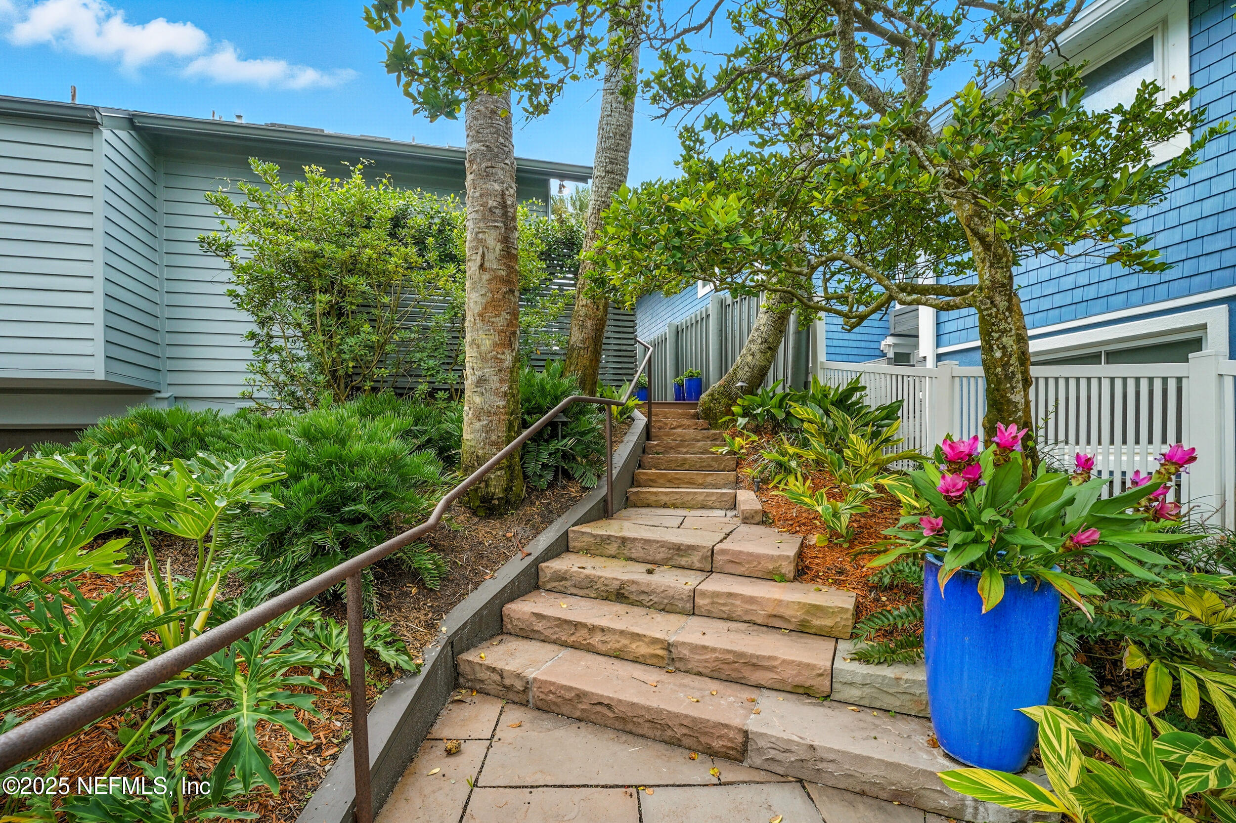 1789 Beach Avenue Atlantic Beach, FL 32233 - Photo 46 of 55 a flower garden with wooden fence