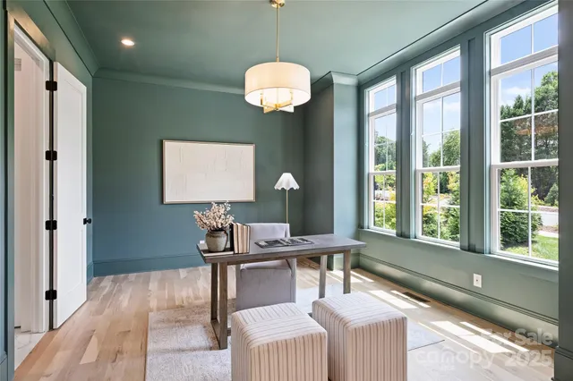 a workspace with furniture and window