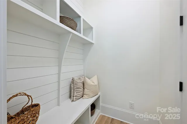 a bathroom with a sink and vanity