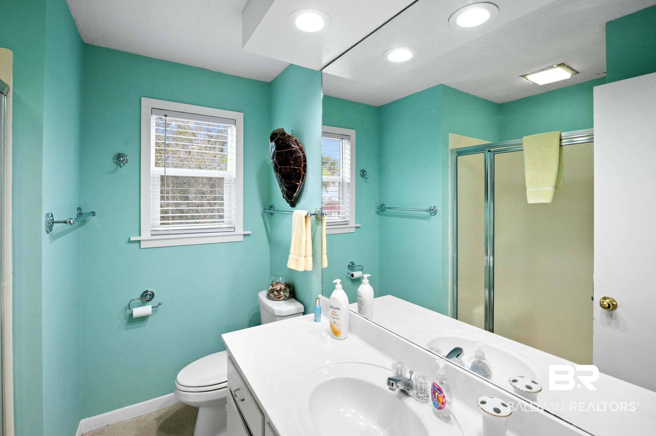 30388 River Road Orange Beach, AL 36561 - Photo 34 of 72 Full bath featuring baseboards, toilet, vanity, a shower stall, and recessed lighting