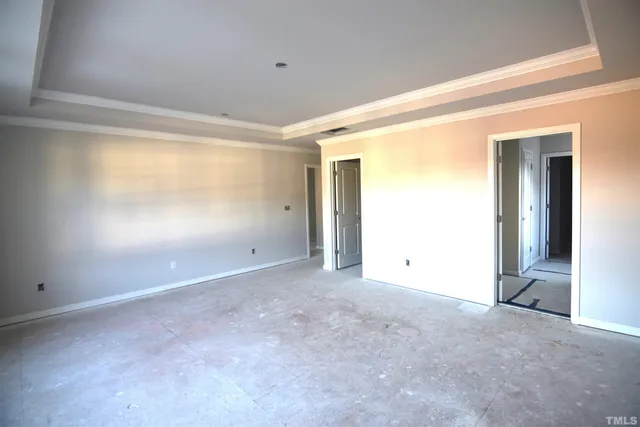 a kitchen with a sink and a refrigerator