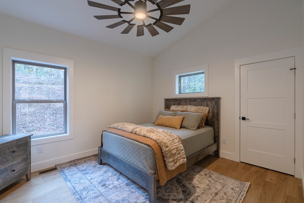 1214 John Abernathy Road Blairsville, GA 30512 - Photo 24 of 53 a bedroom with a bed and window