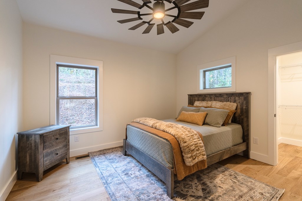 1214 John Abernathy Road Blairsville, GA 30512 - Photo 25 of 53 a bedroom with a bed and a window