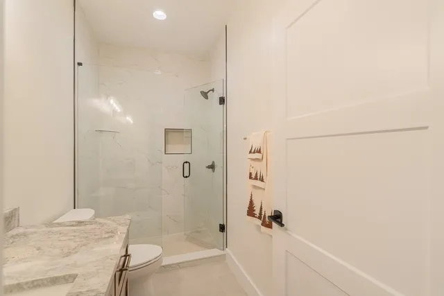 a view of a room with racks on the wall