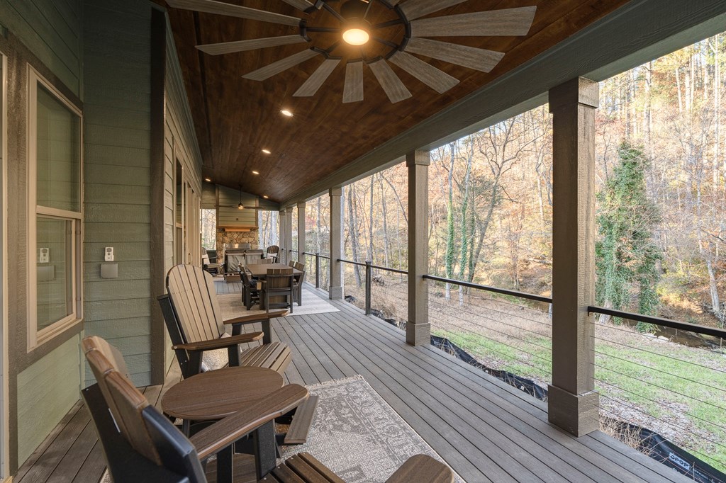 1214 John Abernathy Road Blairsville, GA 30512 - Photo 34 of 53 a living room with furniture and a fireplace