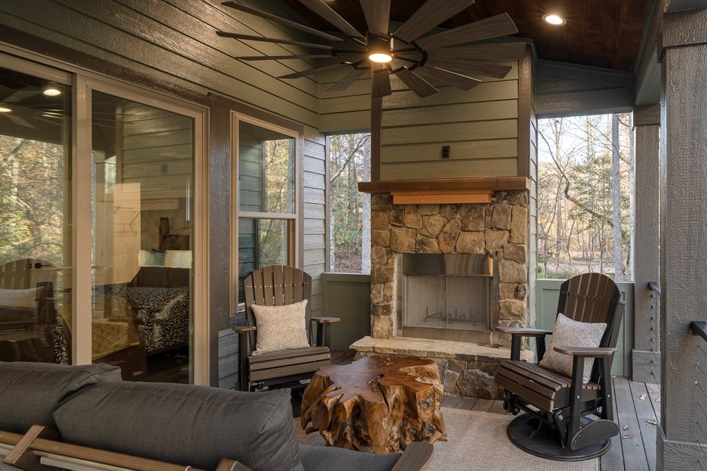 1214 John Abernathy Road Blairsville, GA 30512 - Photo 36 of 53 a living room with furniture and a fireplace